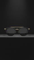 Matte black sunglasses with architectural gold trim
